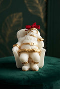 Babbo Natale Sognante - Candela Natalizia | Edizione Oro e Panna